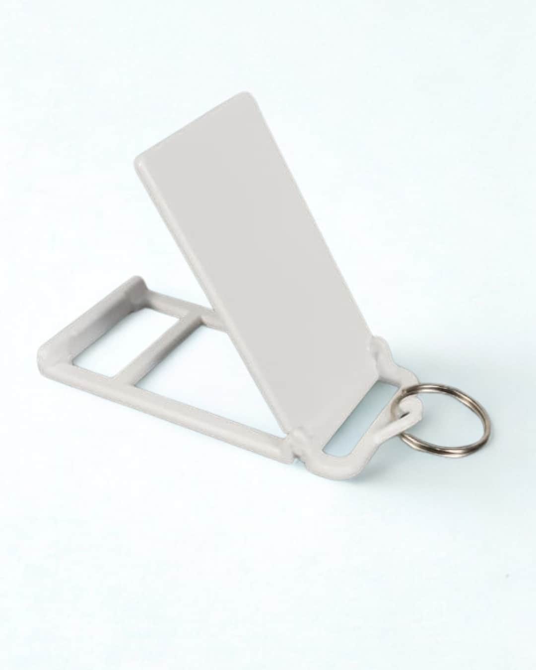 Llavero Plastico Porta Celular 90 x 40 mm - Caja de 20 Unidades