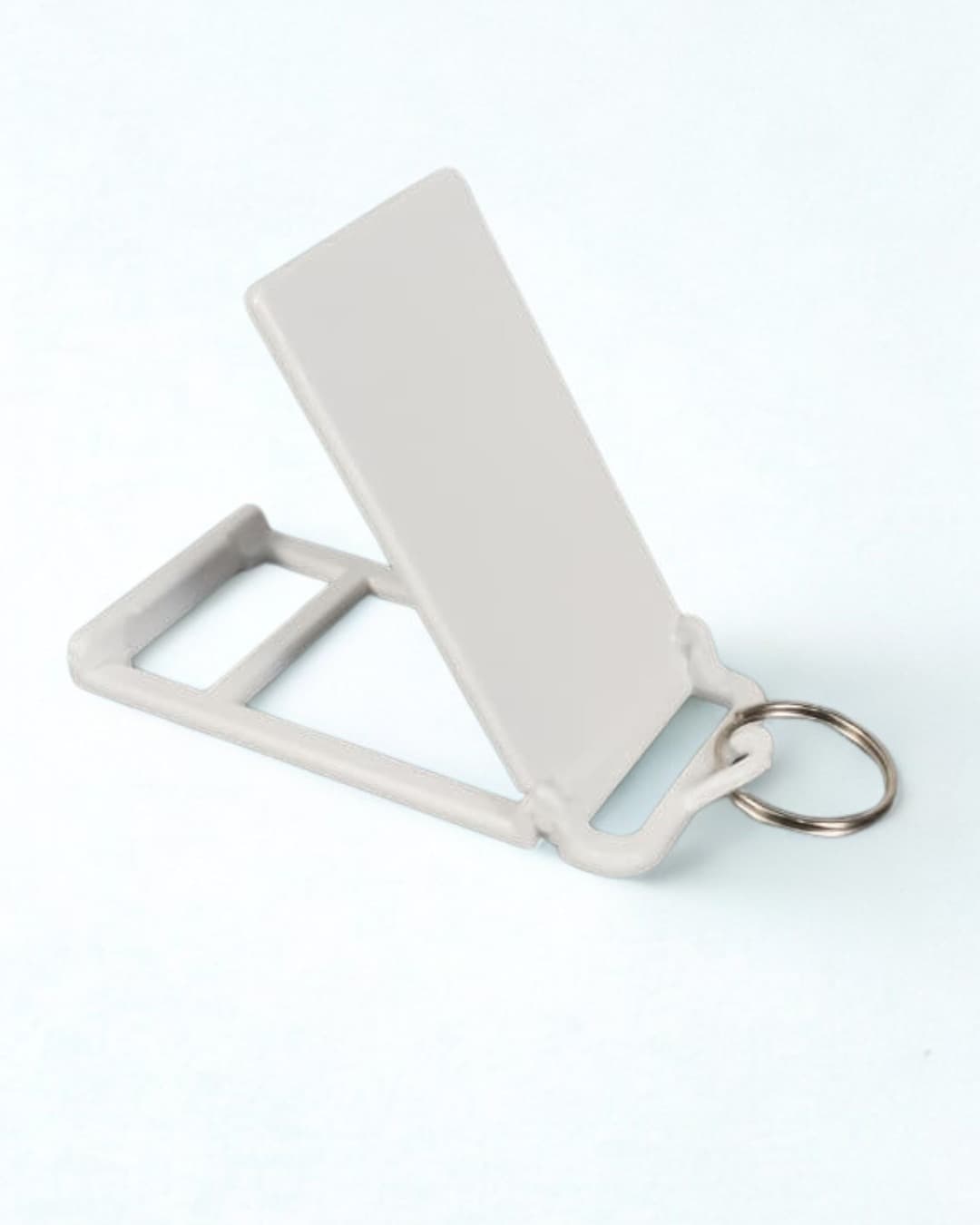 Llavero Plastico Porta Celular 90 x 40 mm - Caja de 20 Unidades